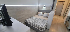 Уютная квартира-студия в новом доме Cozy new apartment with city view